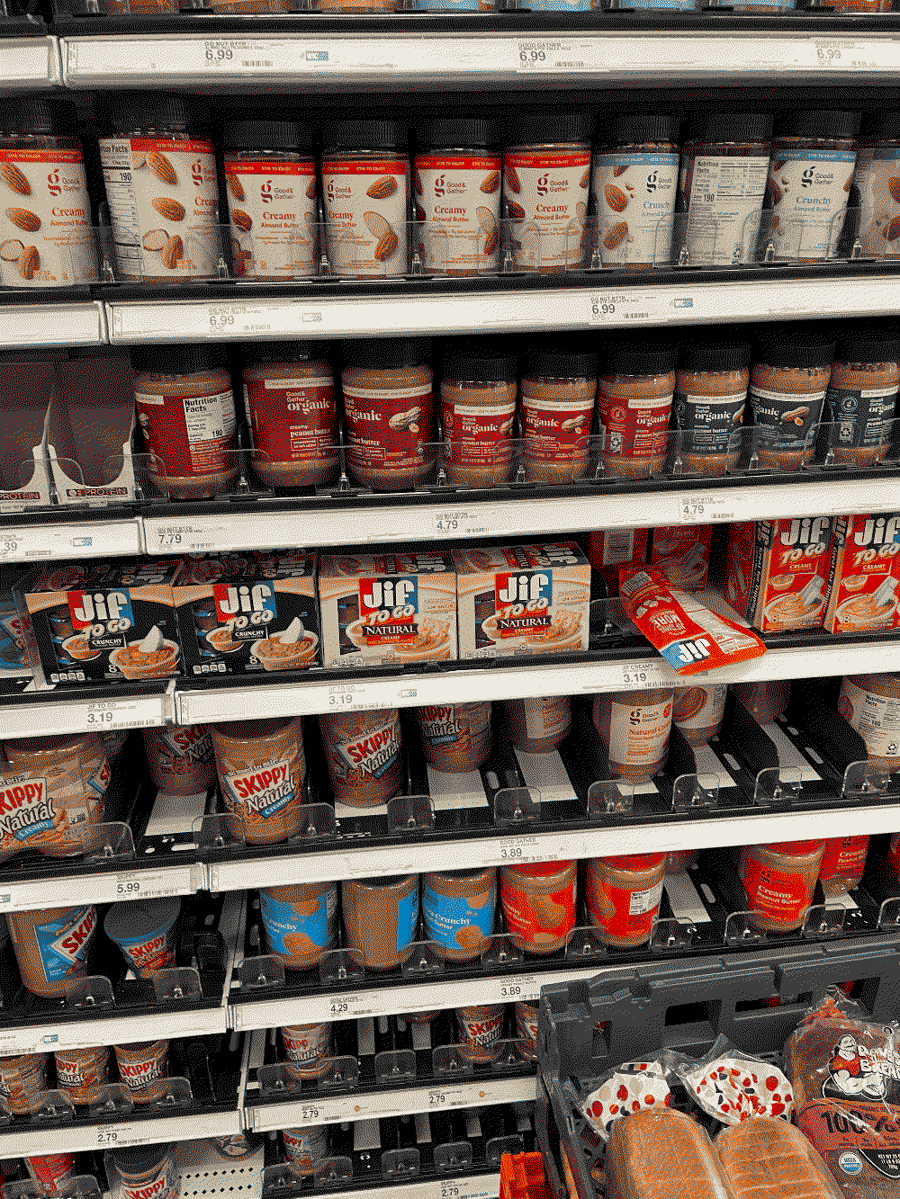 photo of selection of peanut butter at super market