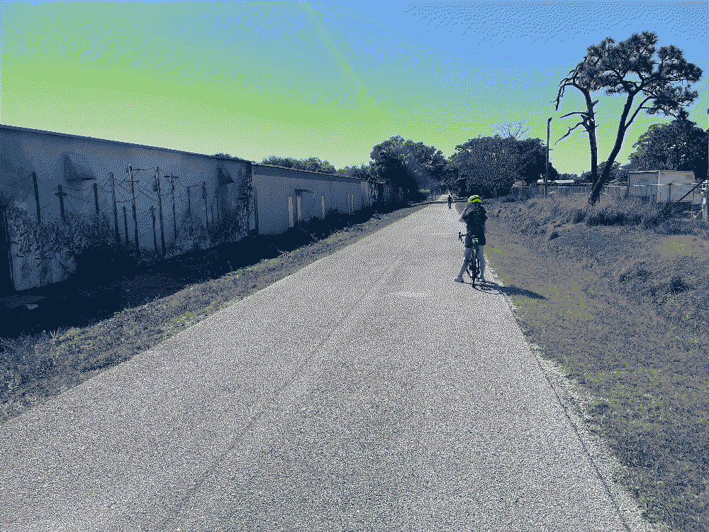 photo of pinelas trail, cyclist in the foreground